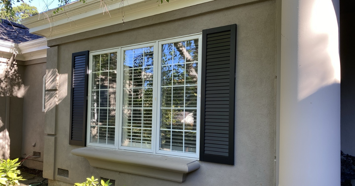 double mulled window with shutters